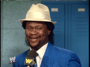 4934 - microphone slick smiling suit wwf